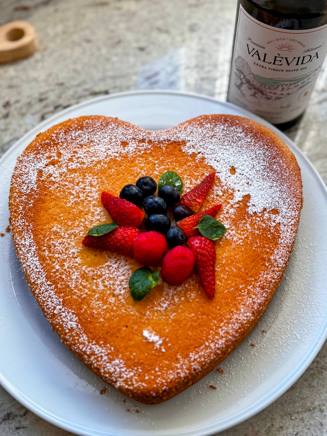 A yogurt and extra virgin olive oil cake, sliced to show the crumb